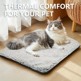 Cat resting on the grey self-warming pet mat